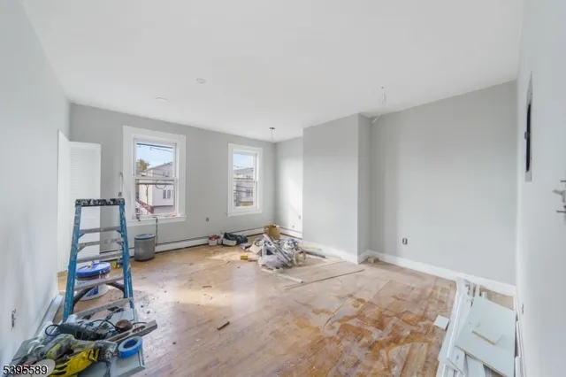 a view of a room with toys and closet