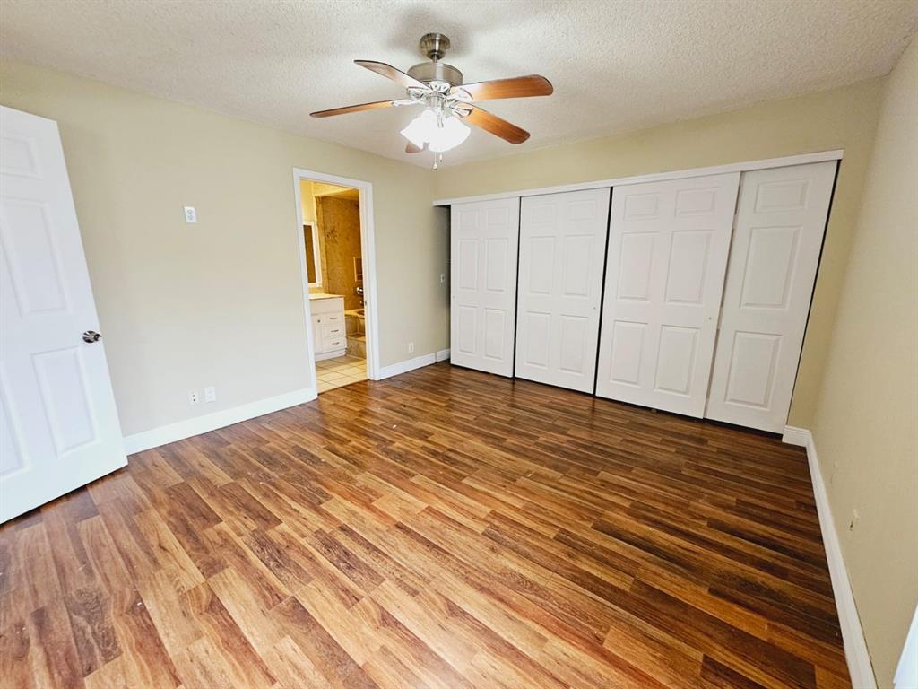 2 Crossings Circle, Unit G Boynton Beach, FL 33435 - Photo 13 of 22 a view of empty room with wooden floor