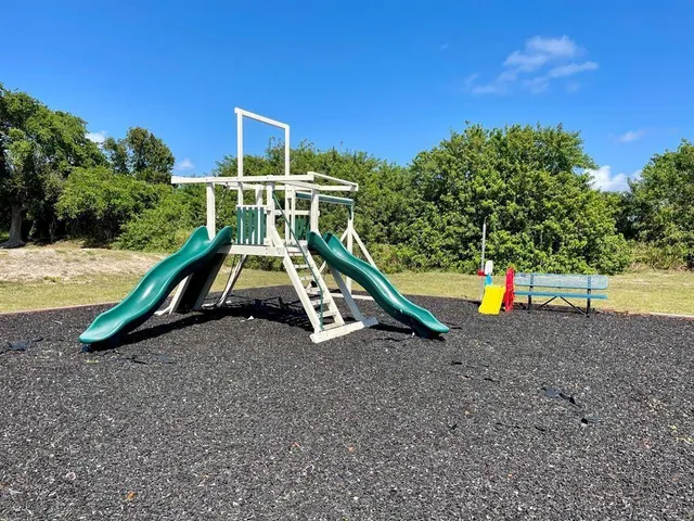 a view of a park with slide