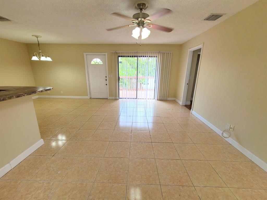 2 Crossings Circle, Unit G Boynton Beach, FL 33435 - Photo 5 of 22 a view of an empty room with a window