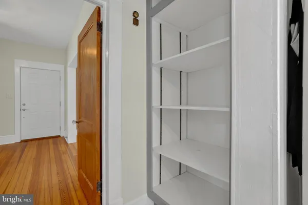 a view of entryway with wooden floor