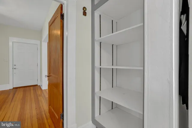 a view of entryway with wooden floor