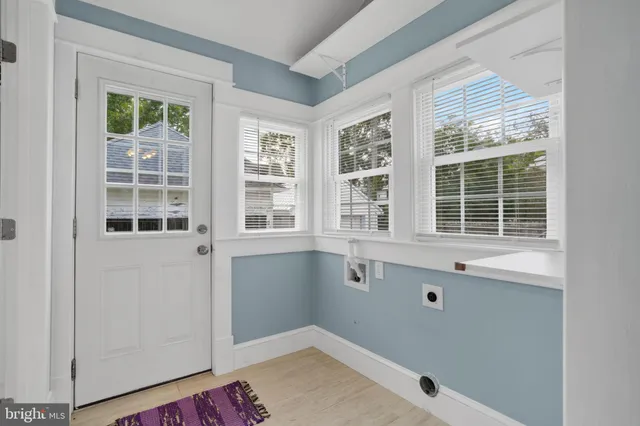 a view of empty room with windows