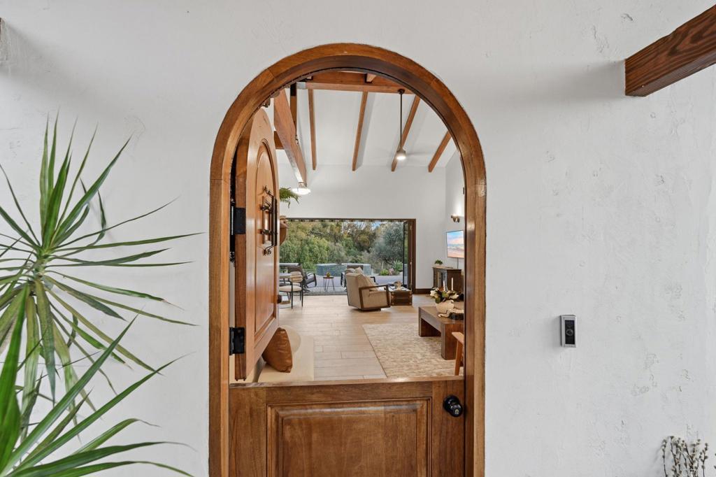 1111 Palomino Road Fallbrook, CA 92028 - Photo 11 of 64 a view of living room with furniture and a large window