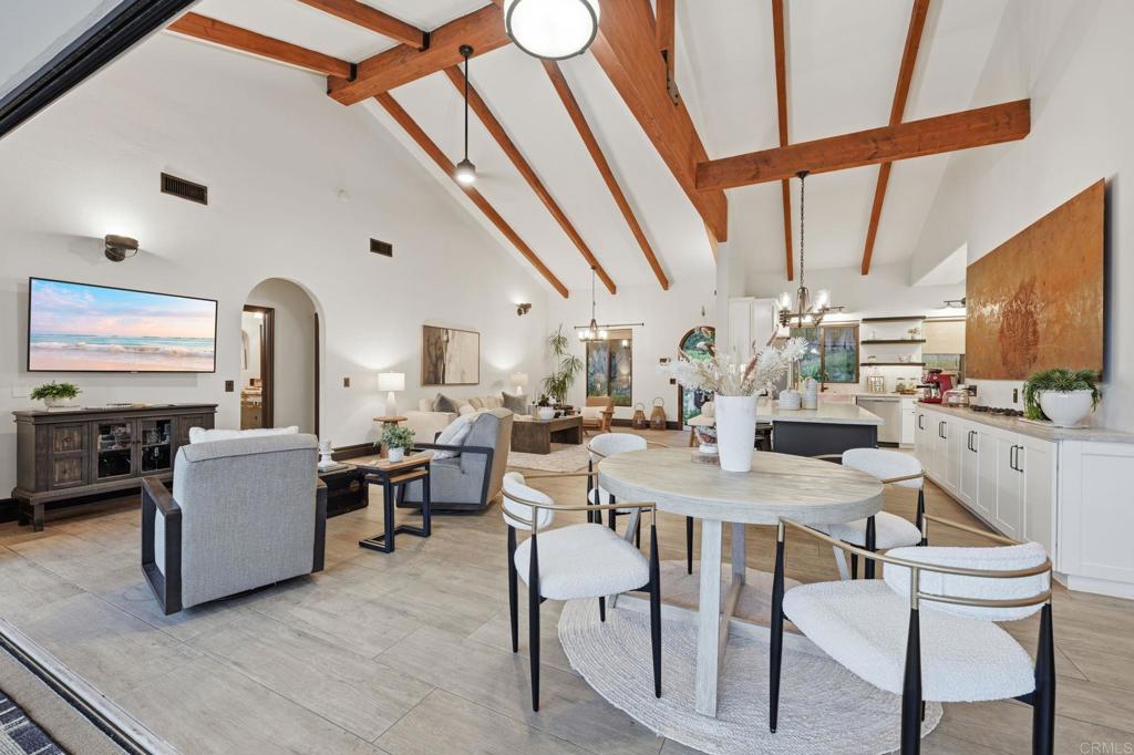 1111 Palomino Road Fallbrook, CA 92028 - Photo 22 of 64 a view of a dining room with furniture window and wooden floor