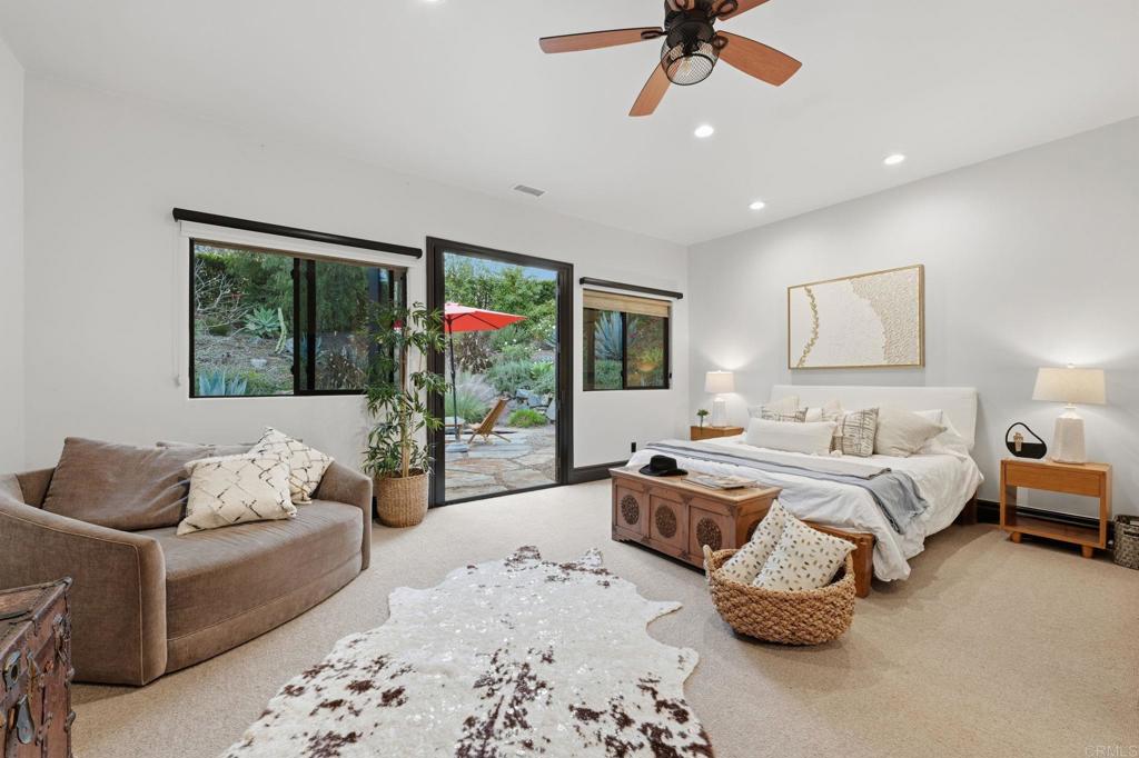1111 Palomino Road Fallbrook, CA 92028 - Photo 24 of 64 a bedroom with furniture and a large window