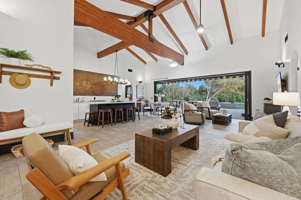 1111 Palomino Road Fallbrook, CA 92028 - Photo 3 of 64 a living room with furniture and a flat screen tv