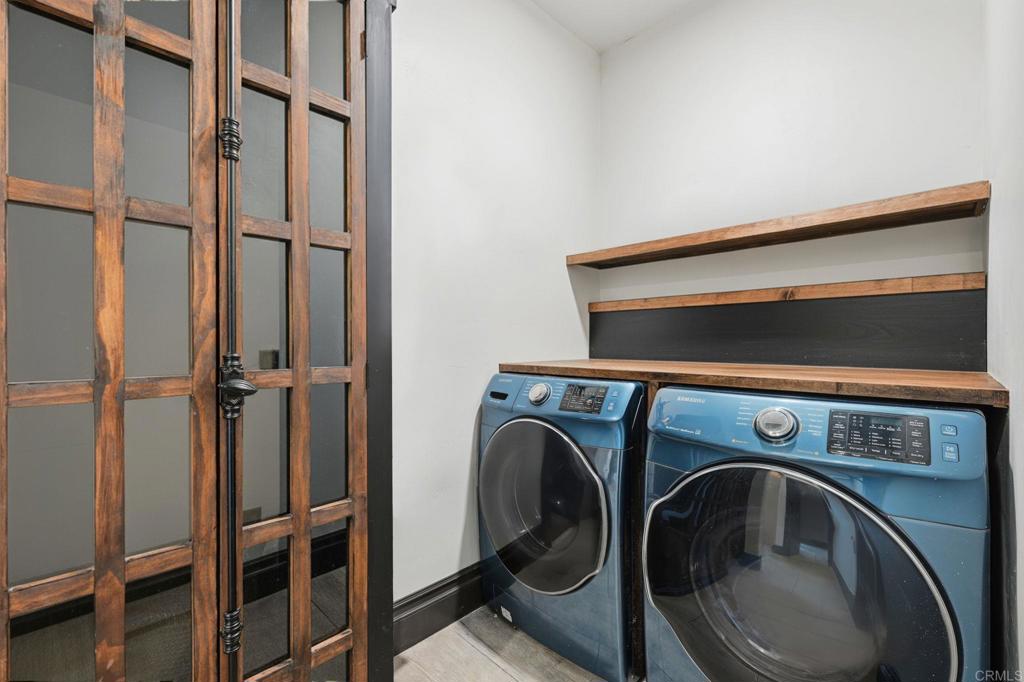 1111 Palomino Road Fallbrook, CA 92028 - Photo 32 of 64 a utility room with dryer and washer