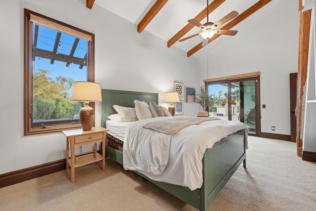 1111 Palomino Road Fallbrook, CA 92028 - Photo 35 of 64 a bedroom with a bed and a window