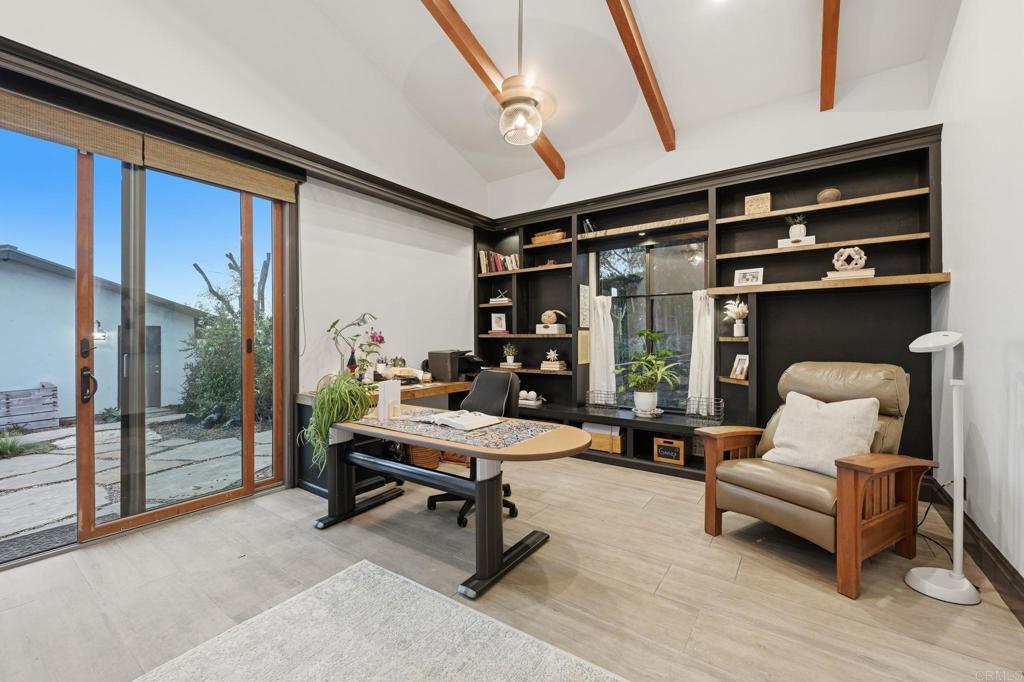 1111 Palomino Road Fallbrook, CA 92028 - Photo 39 of 64 a living room with furniture a rug and a large window
