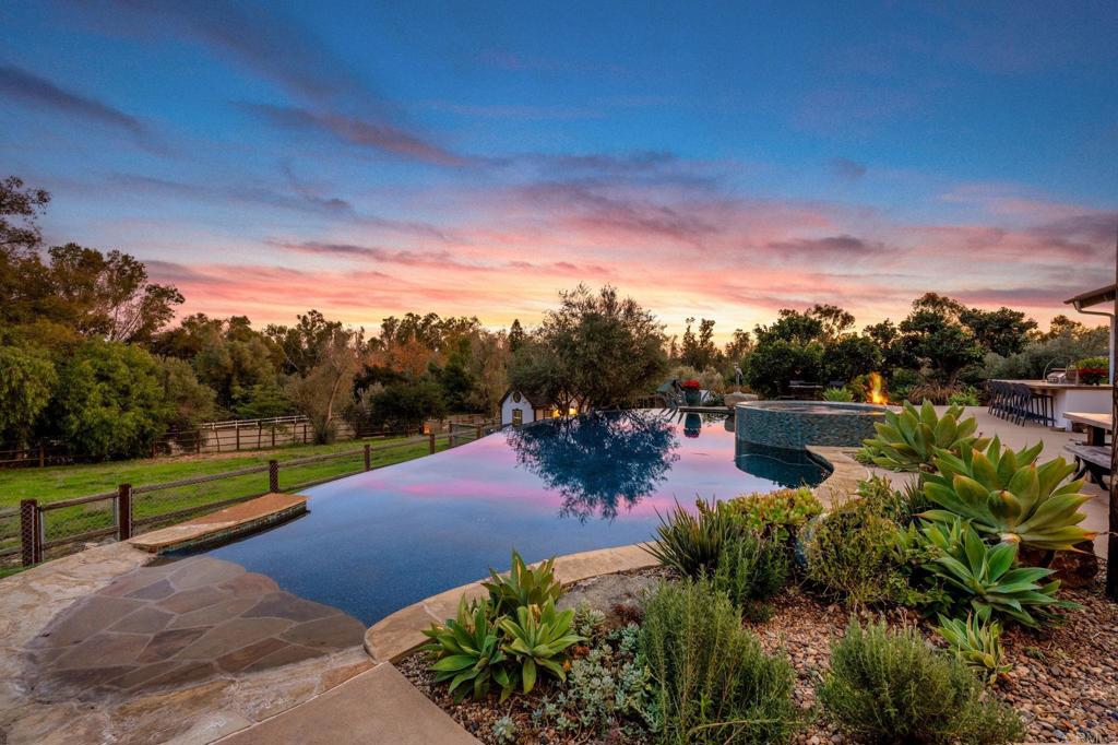 1111 Palomino Road Fallbrook, CA 92028 - Photo 44 of 64 a view of a garden with lawn chairs