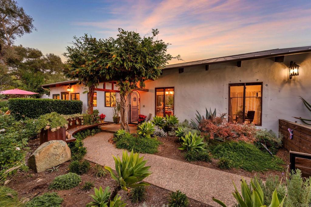 1111 Palomino Road Fallbrook, CA 92028 - Photo 8 of 64 a backyard of a house with lots of green space