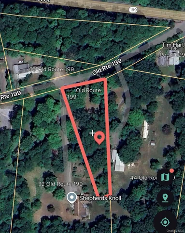 a view of empty yard with trees