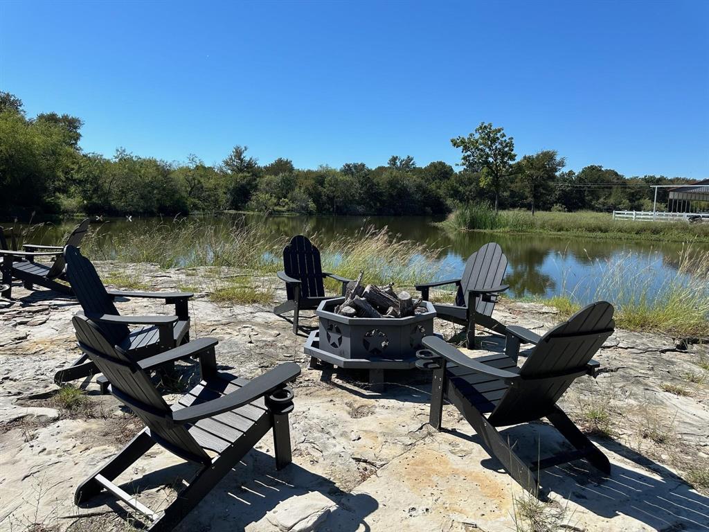 2935 Mattie Ross Road Cresson, TX 76035 - Photo 13 of 23 a view of a lake with outdoor seating