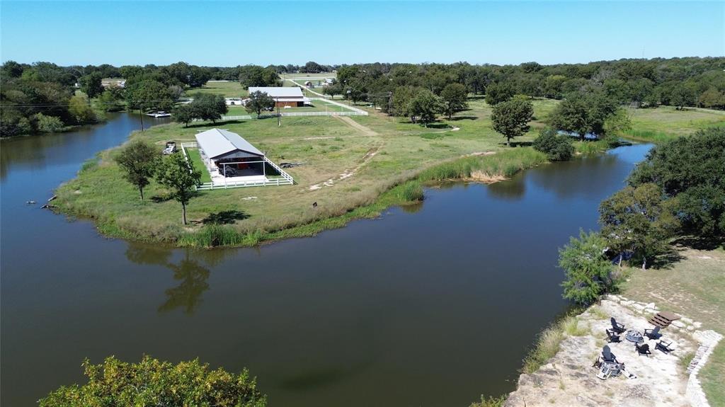 2935 Mattie Ross Road Cresson, TX 76035 - Photo 5 of 23 an aerial view of a house with a yard and lake view