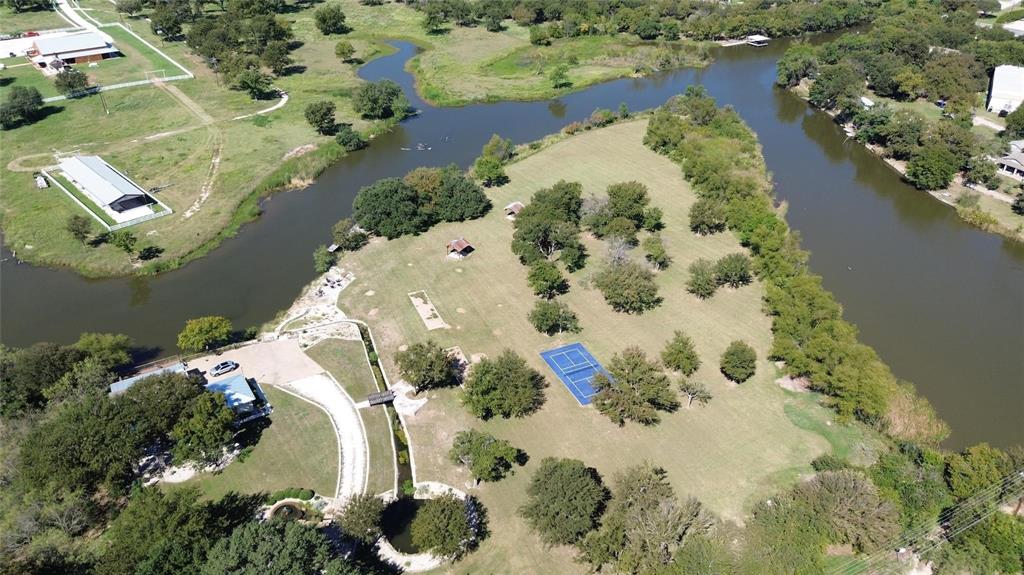 2935 Mattie Ross Road Cresson, TX 76035 - Photo 6 of 23 an aerial view of a house with a lake view