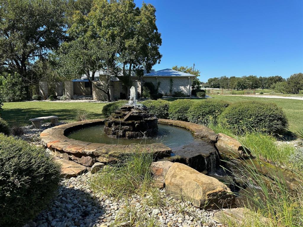 2935 Mattie Ross Road Cresson, TX 76035 - Photo 8 of 23 a view of a house with pool and a yard