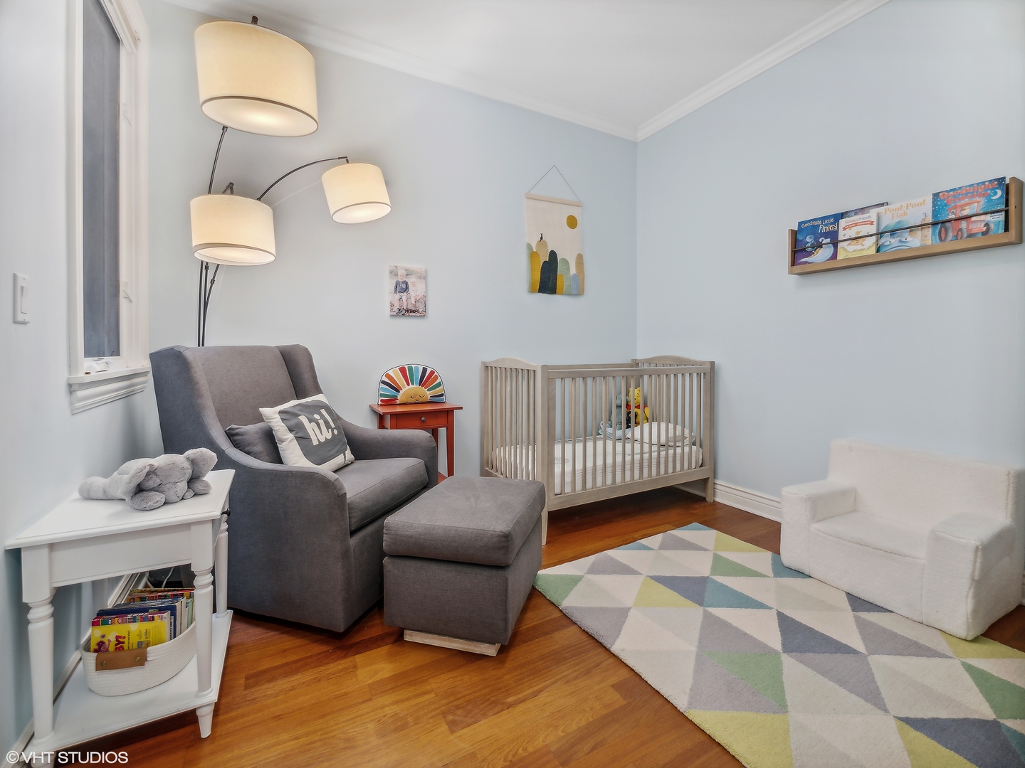 1428 West Irving Park Road, Unit 3 Chicago, IL 60613 - Photo 12 of 18 a living room with furniture and a rug