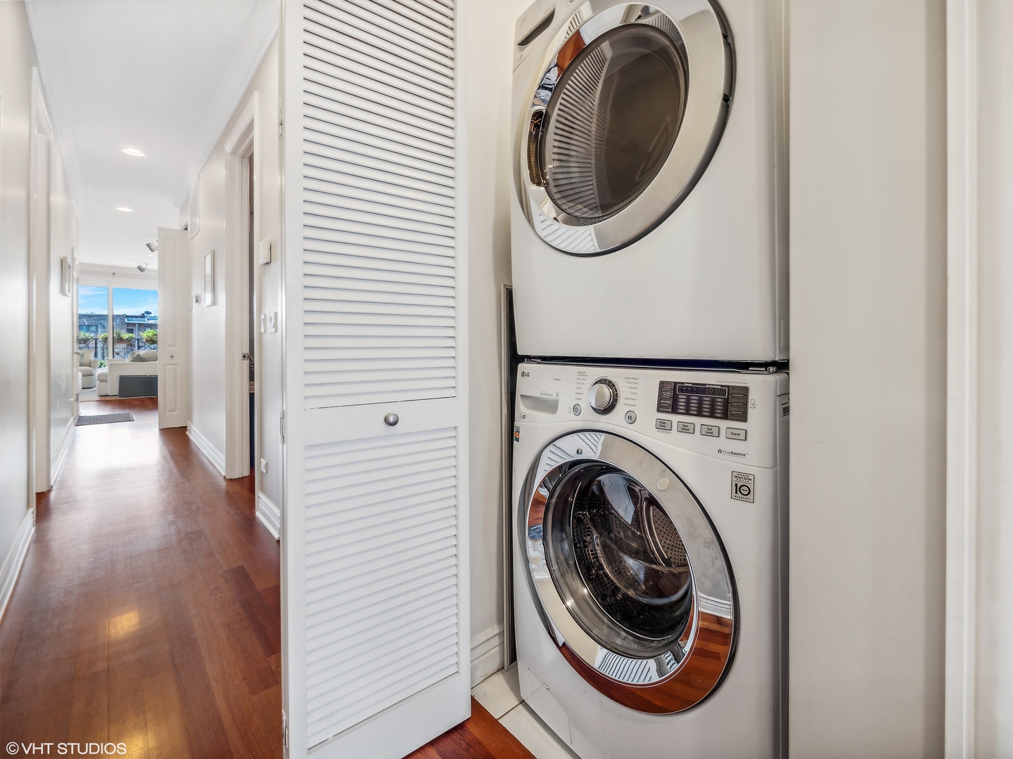 1428 West Irving Park Road, Unit 3 Chicago, IL 60613 - Photo 17 of 18 a view of a hallway with washer and dryer