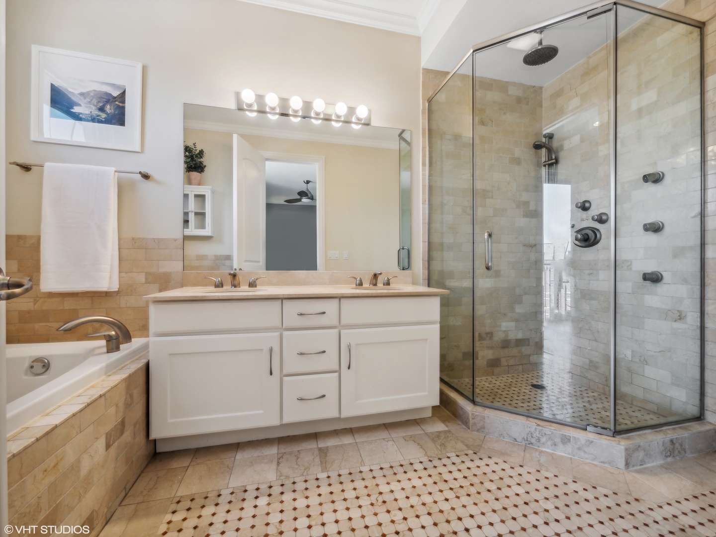 1428 West Irving Park Road, Unit 3 Chicago, IL 60613 - Photo 10 of 18 a bathroom with a sink a toilet a mirror and shower