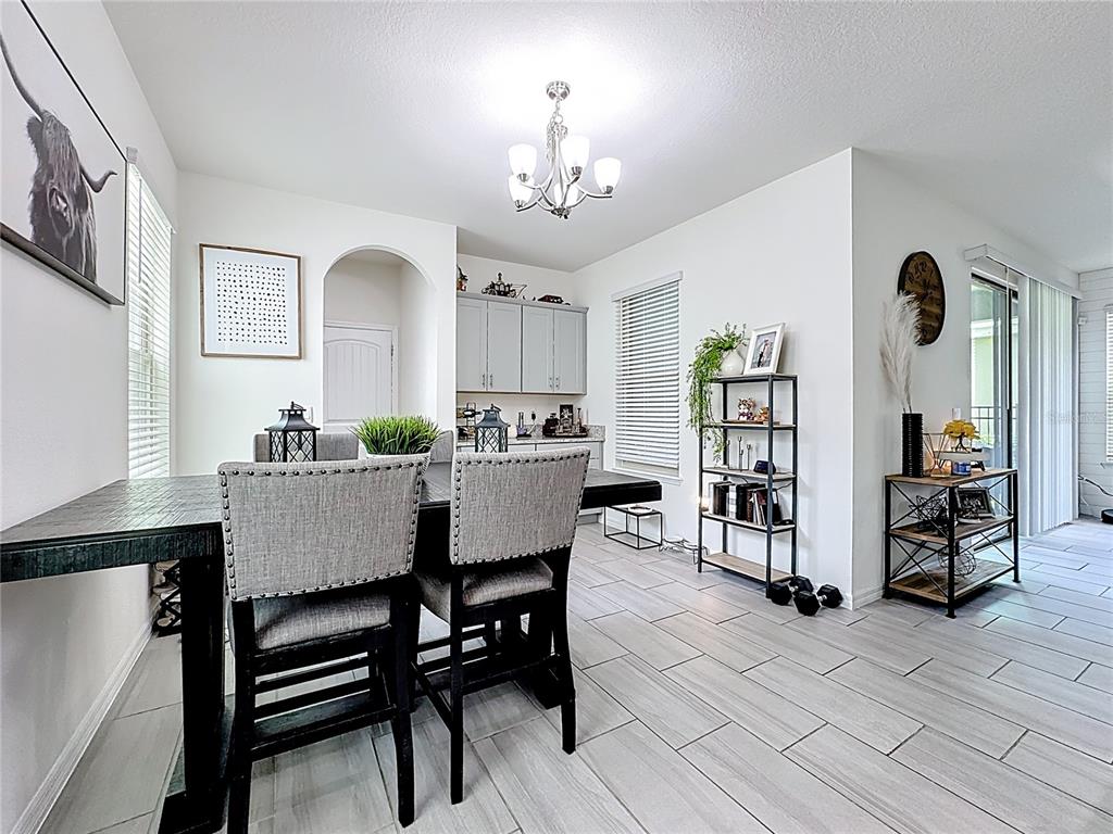 16632 Point Rock Drive Winter Garden, FL 34787 - Photo 20 of 74 a dining room with furniture and window