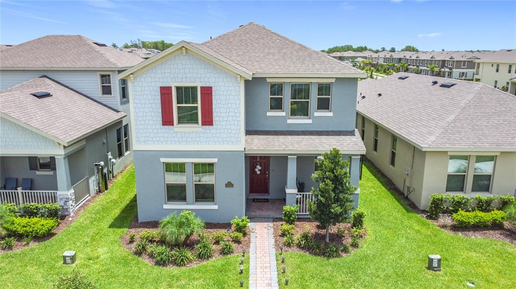 16632 Point Rock Drive Winter Garden, FL 34787 - Photo 2 of 74 front view of a house with a yard