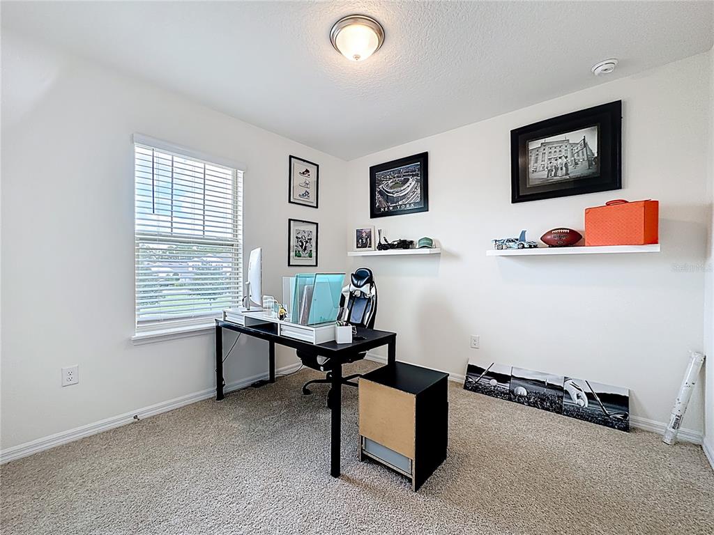 16632 Point Rock Drive Winter Garden, FL 34787 - Photo 24 of 74 a workspace with furniture and window
