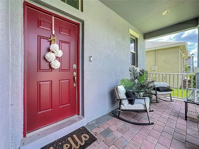 a view of a livingroom with wooden floor and a window