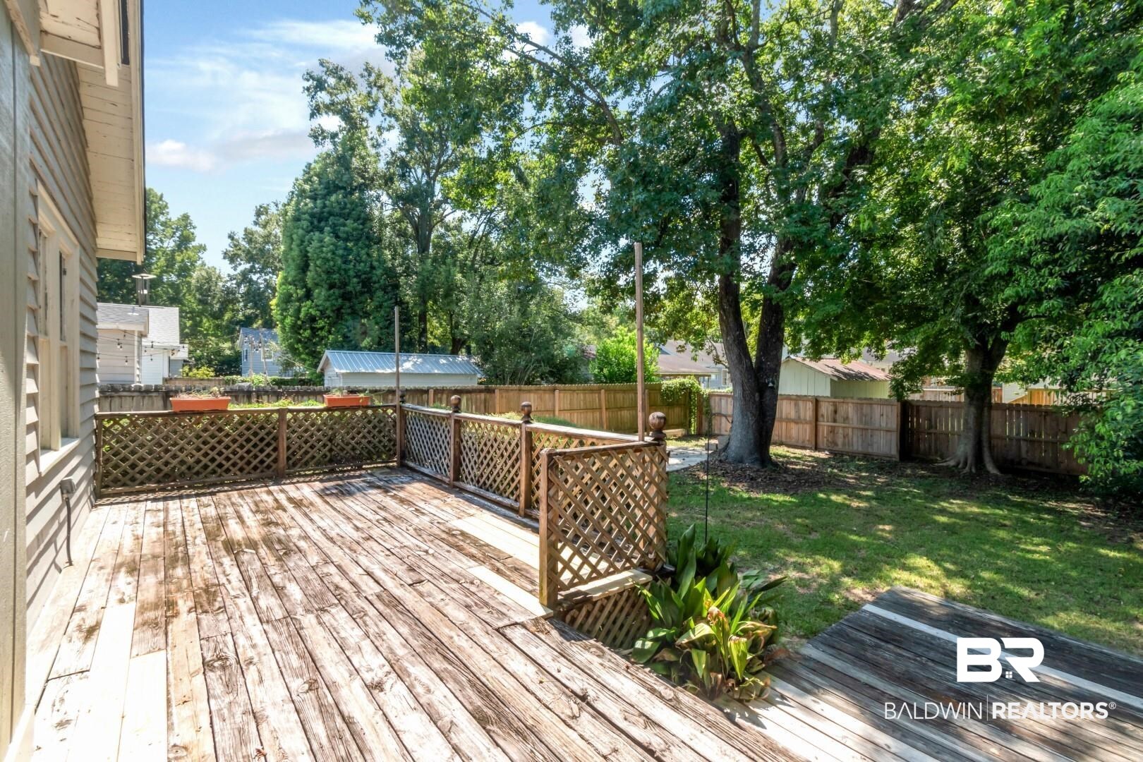 112 South Fulton Street Mobile, AL 36606 - Photo 27 of 35 Wooden deck with a lawn