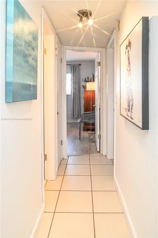 a bathroom with a shower and a mirror