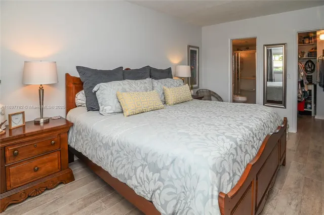 a bathroom with a sink a mirror and a toilet