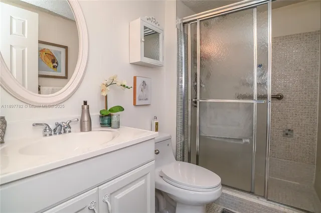 a view of a chairs and table in backyard