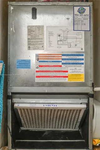 a view of a swimming pool with outdoor seating