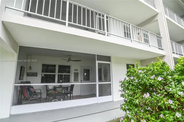 a view of a backyard with plants