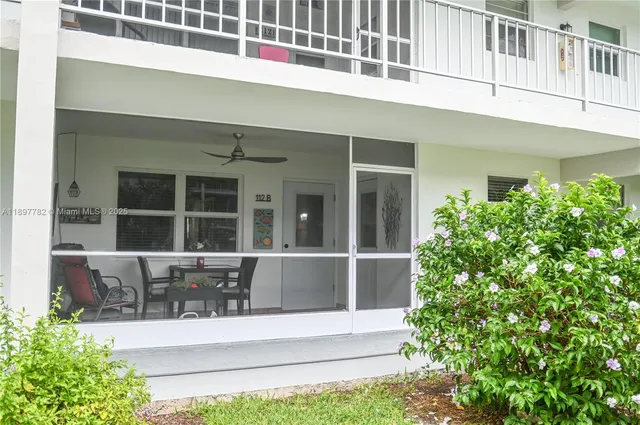 a view of a yard in front of a house
