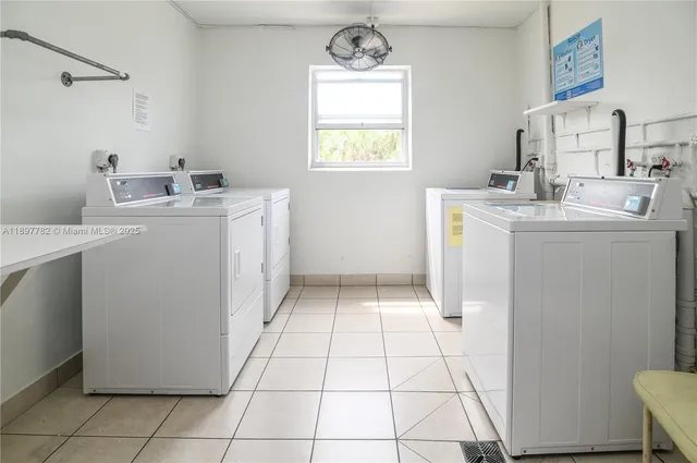 a view of a swimming pool with a patio and a garden