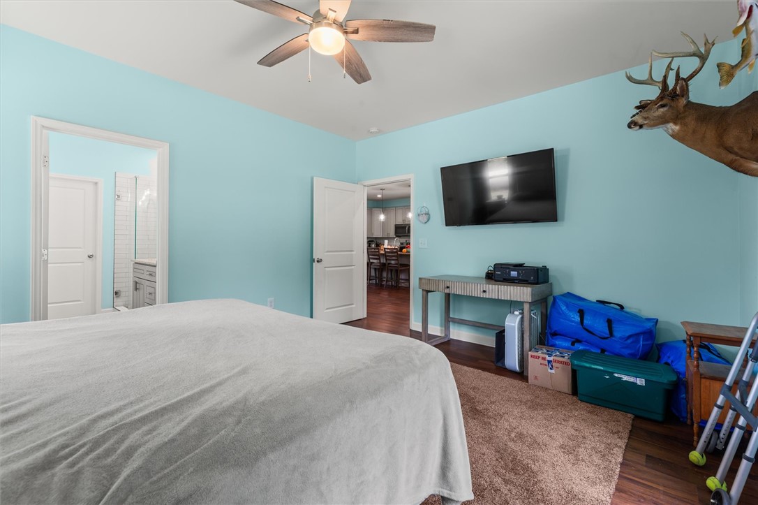 67 Sawblade Ridge Marietta, SC 29661 - Photo 24 of 37 Gleaming wood floors anchor this comfortable room with an ensuite bath.
