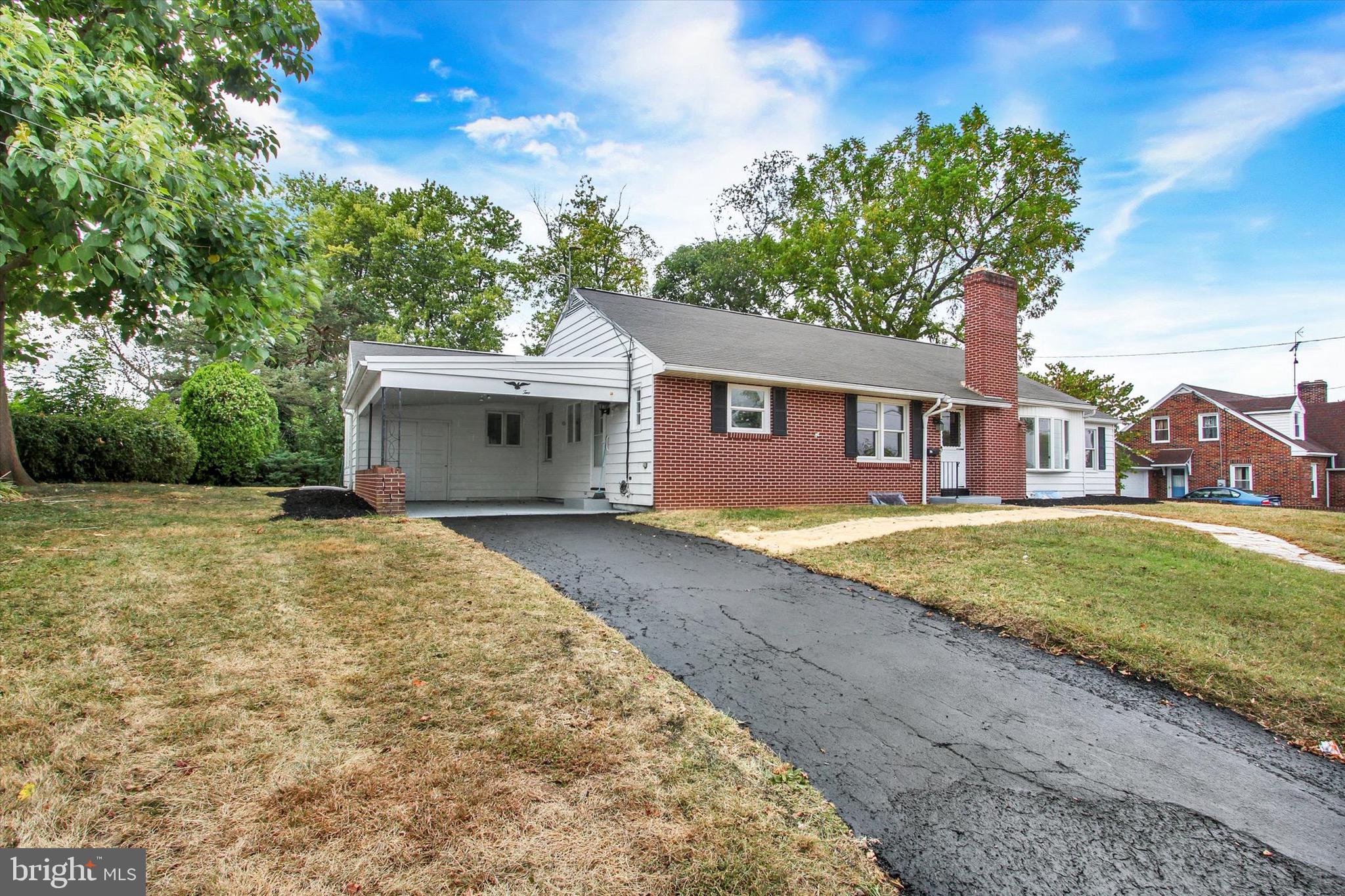 22 Rita Marie Avenue Littlestown, PA 17340 - Photo 3 of 34 a front view of a house with a yard