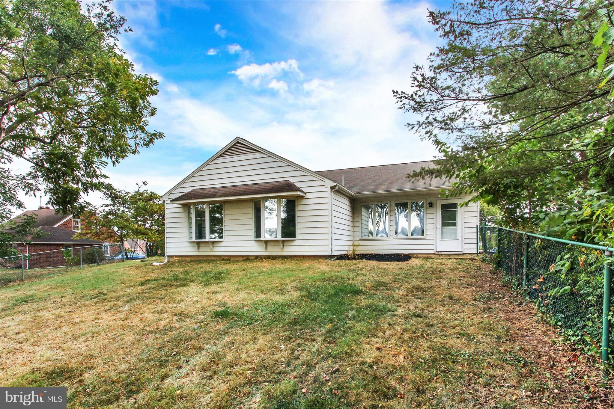 22 Rita Marie Avenue Littlestown, PA 17340 - Photo 31 of 34 a front view of a house with a garden and yard