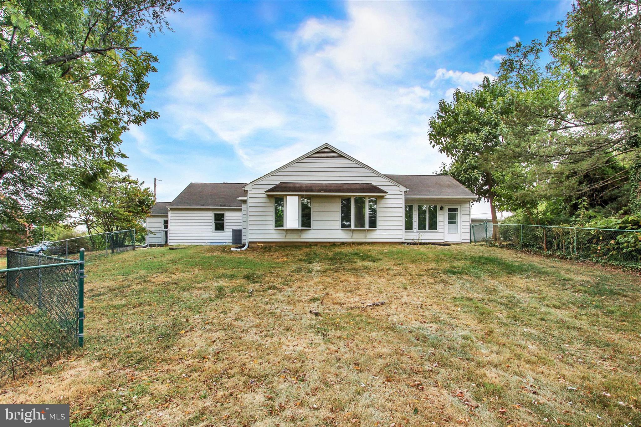 22 Rita Marie Avenue Littlestown, PA 17340 - Photo 32 of 34 a front view of a house with a garden