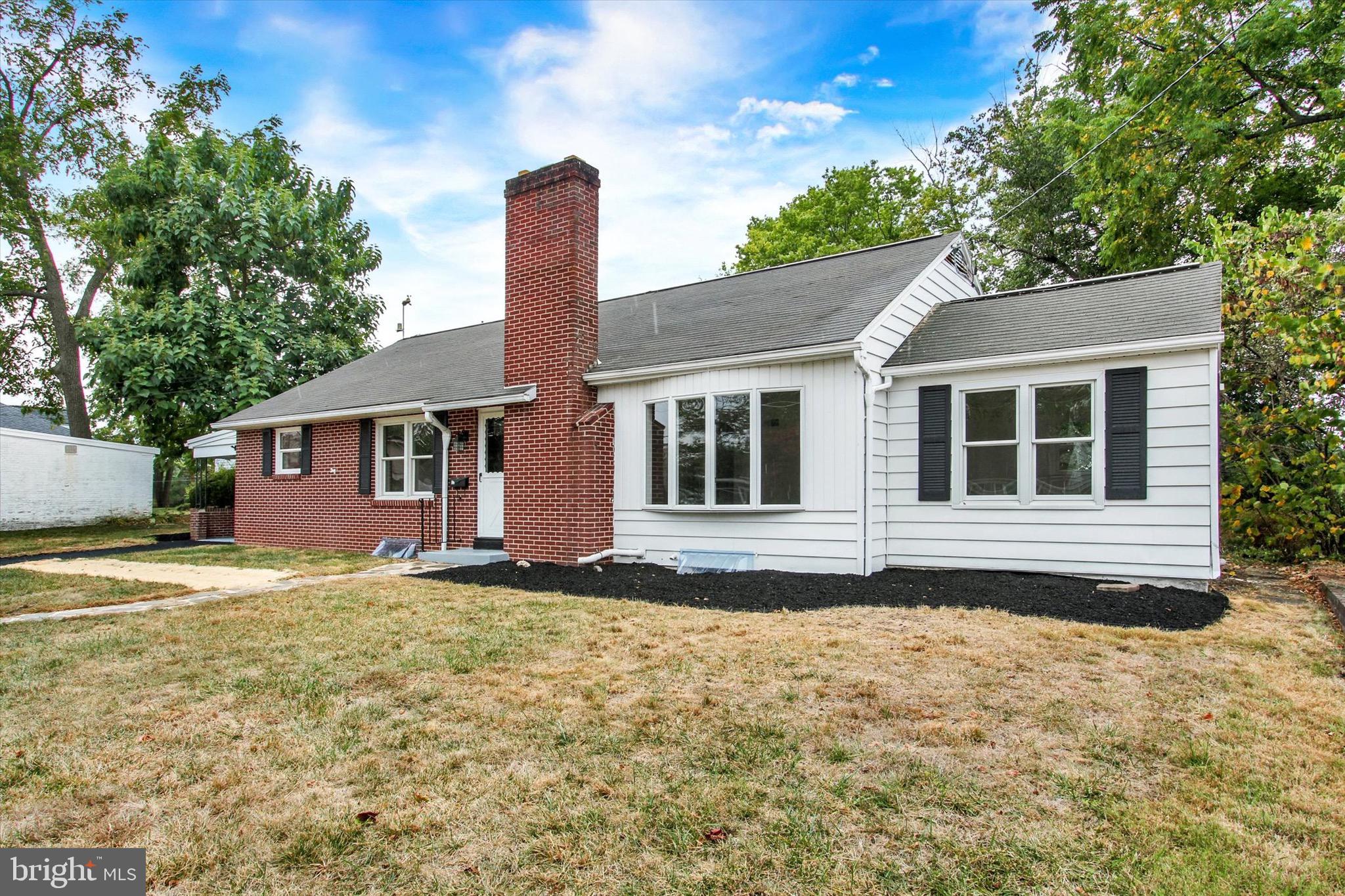 22 Rita Marie Avenue Littlestown, PA 17340 - Photo 4 of 34 a front view of a house with a yard