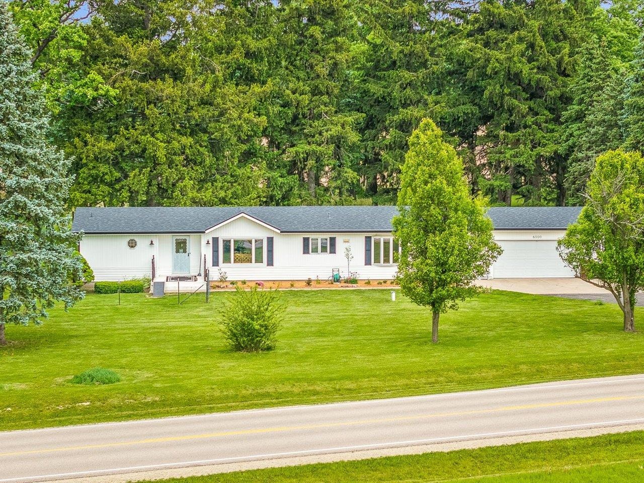 8500 Manchester Road Capron, IL 61012 - Photo 5 of 51 a front view of a house with a yard