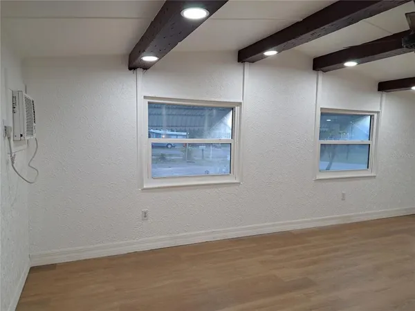 an empty room with a workbench