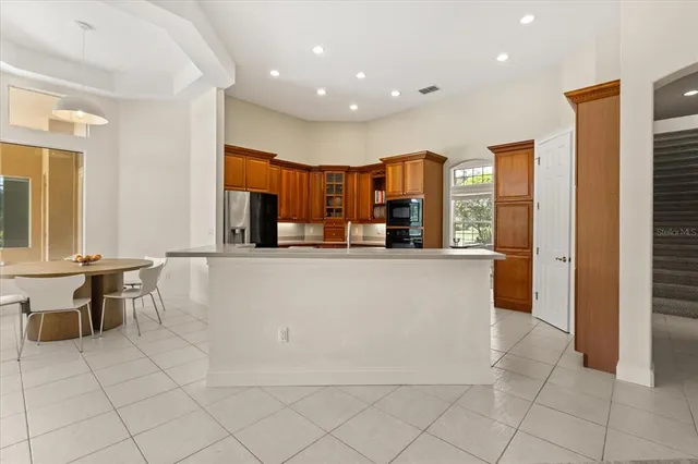 a view of kitchen with furniture and window