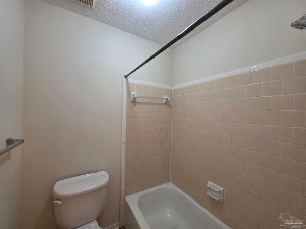 a bathroom with a sink and toilet