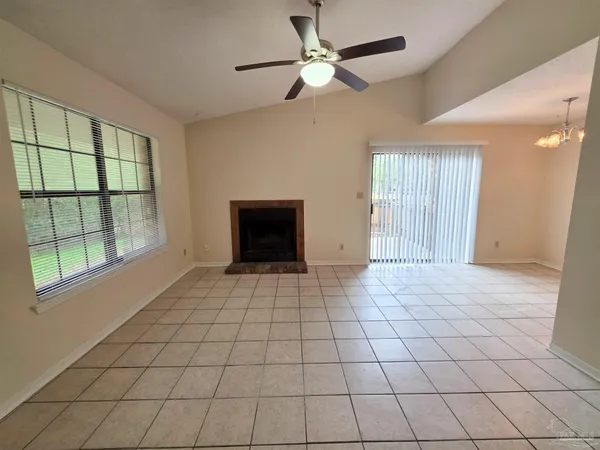 a view of an empty room and window
