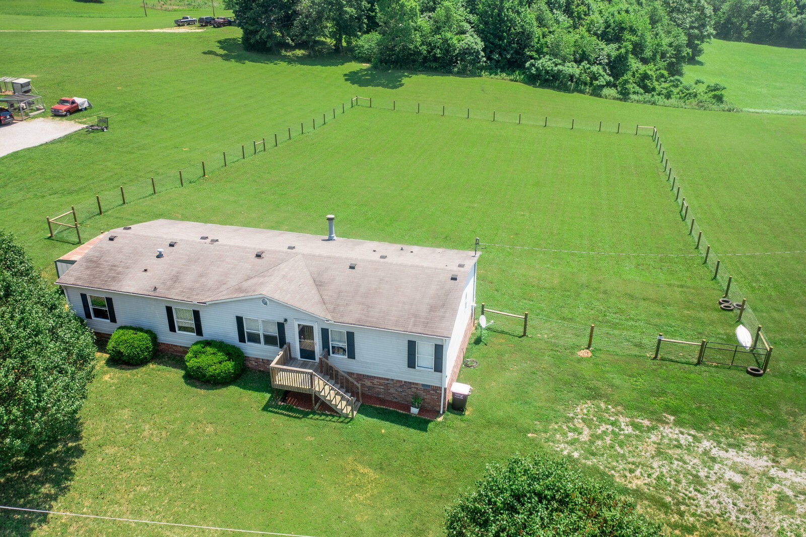 3853 Atkins Road Cedar Hill, TN 37032 - Photo 22 of 22 an aerial view of a house having yard