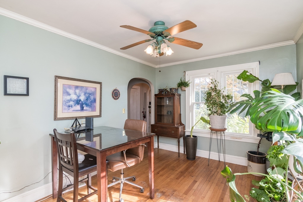 28 Rencelau Street Springfield, MA 01118 - Photo 13 of 34 a view of a dining room with furniture window and wooden floor
