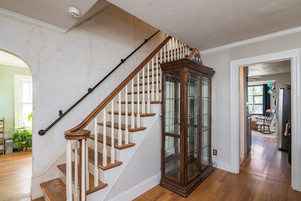 28 Rencelau Street Springfield, MA 01118 - Photo 20 of 34 a view of an entryway with wooden floor and door