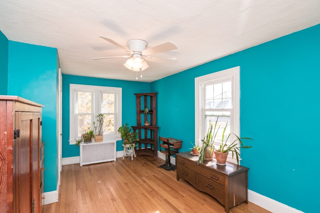 28 Rencelau Street Springfield, MA 01118 - Photo 27 of 34 a living room with furniture and a large window